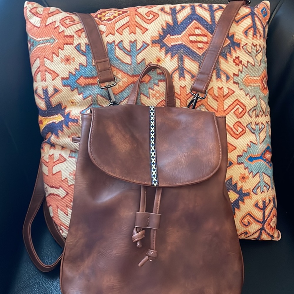 Cute vegan leather backpack - drawstring and snap closure.   Like New!